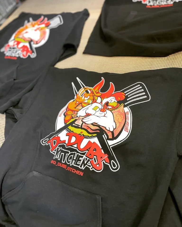 Black shirts with chicken graphic